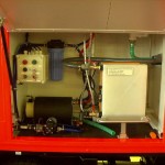 Technikbereich für die Wasseraufnahme und -abgabe. Der formfeste Schlauch kann elektrisch aufgetrommelt werden.