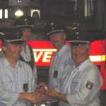 Freuen sich über die neue Ausrüstung: LBFV/S Werner Burmester und WF Werner Meyer (vorn) sowie WFV Thomas Hitscher und Gerätewart Holger Knoblauch dahinter.